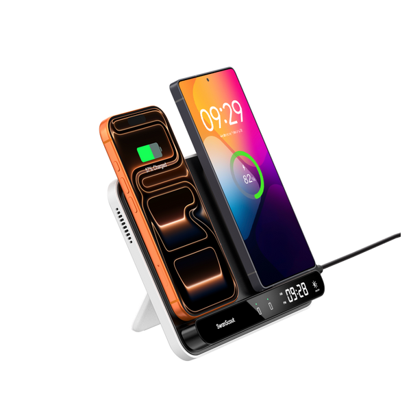 SwanScout 504 dual wireless charging stand simultaneously powering an iPhone 17 and a Samsung Galaxy S25 Ultra with a built-in touch clock